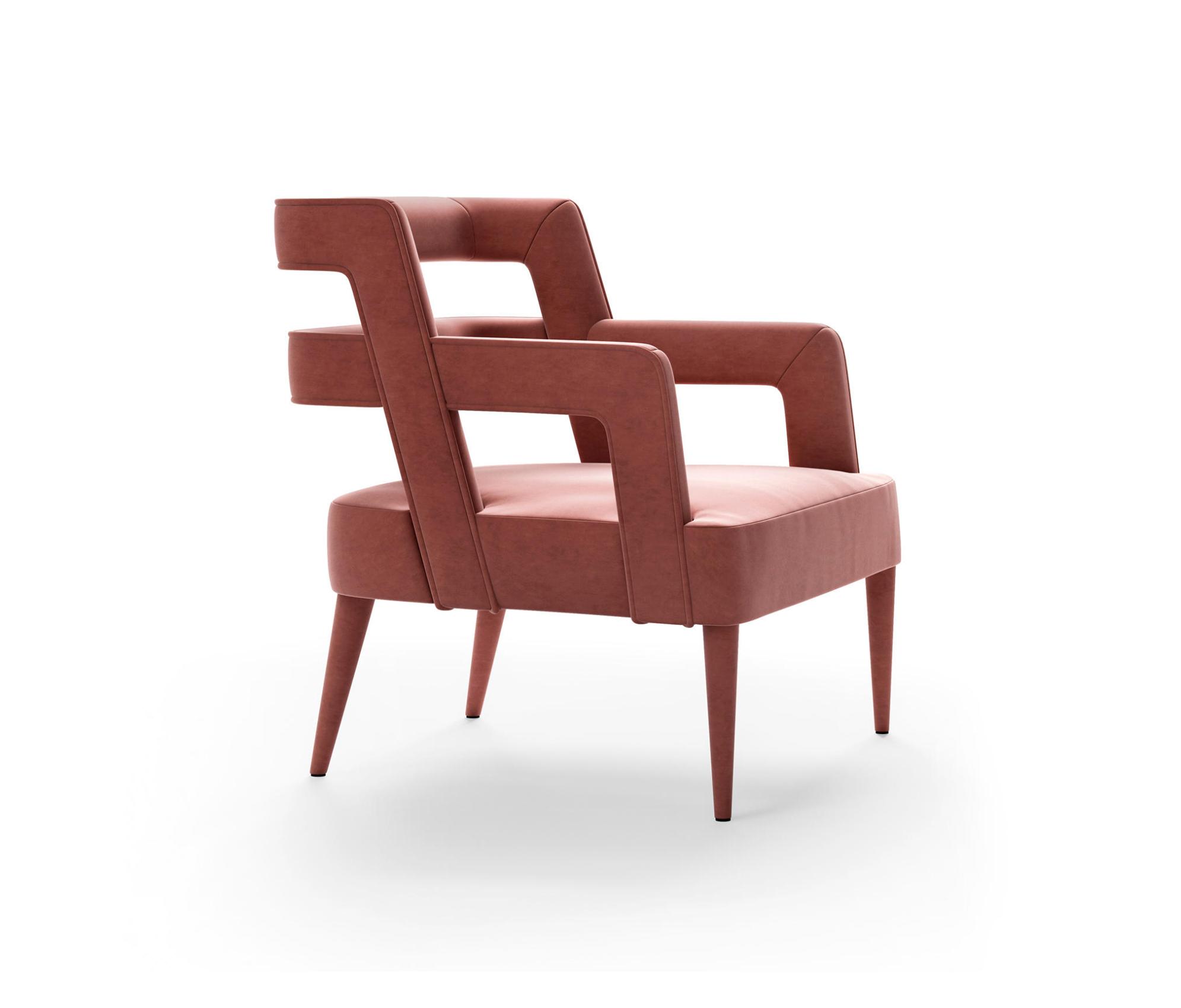 Gestoffeerde roze fauteuil