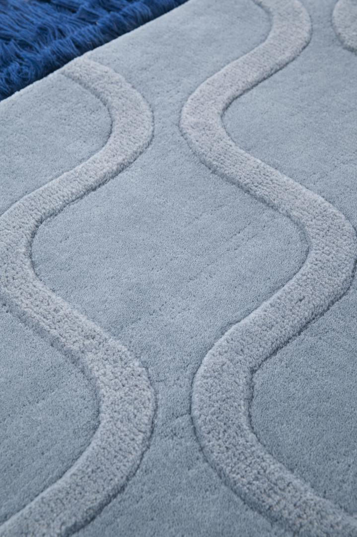 Tapis tufté main bleu clair