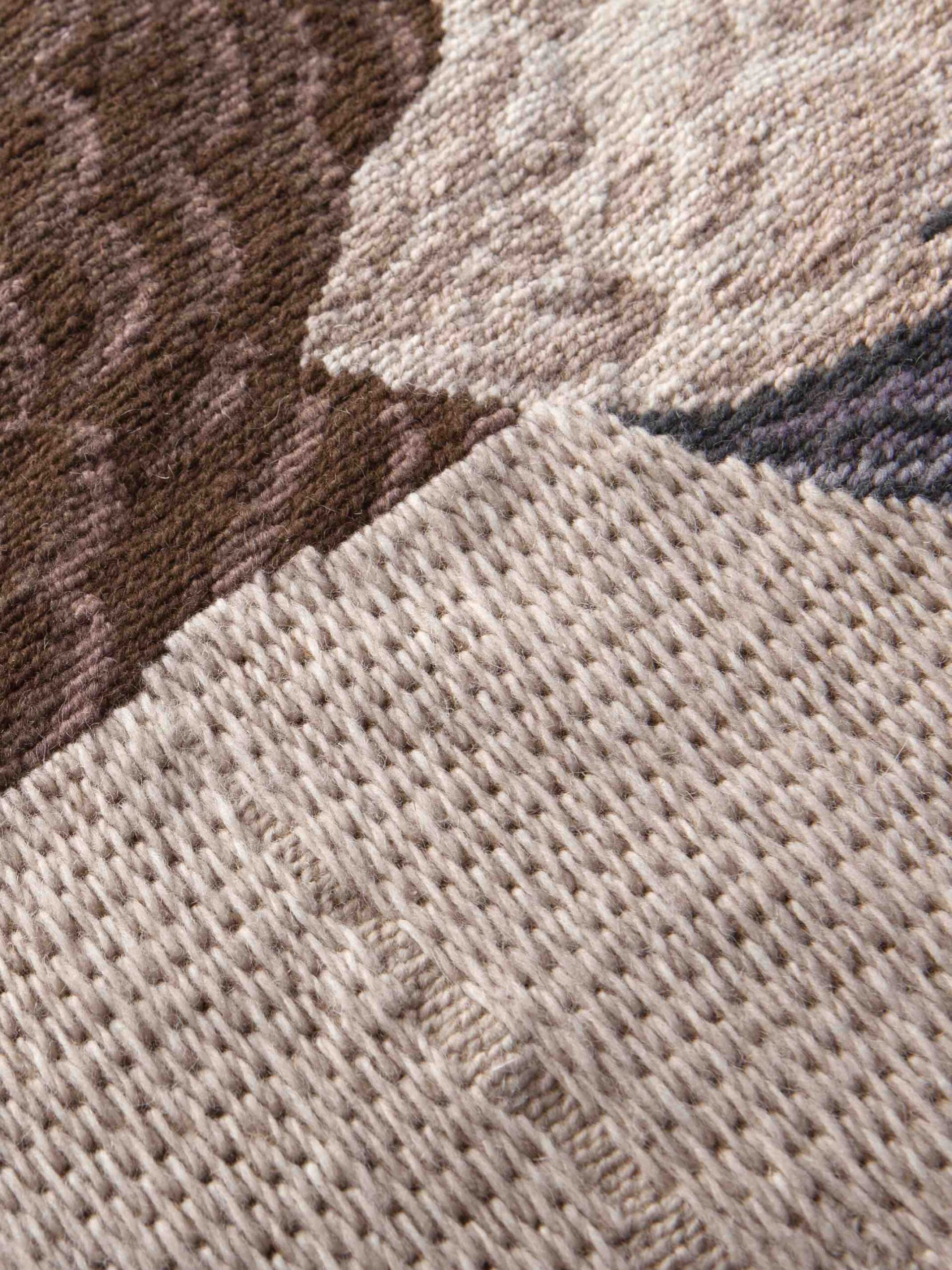 Tapis rond design tissé main Migration Pettirosso