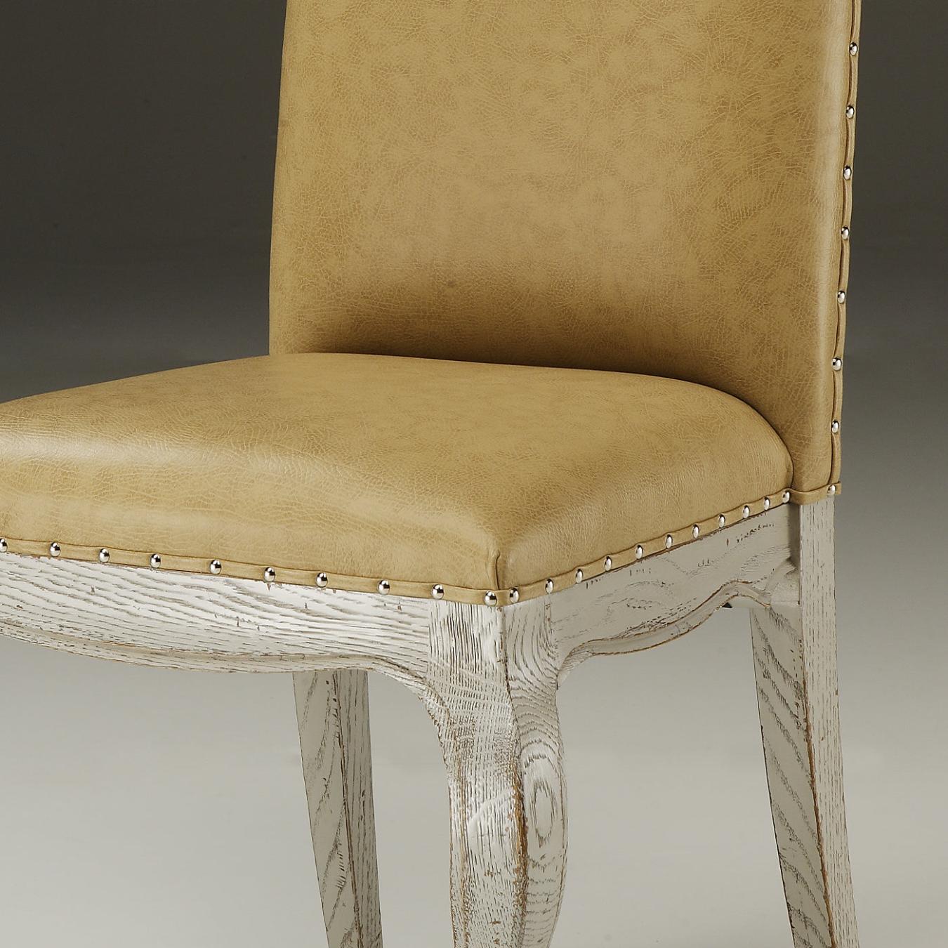 Gestoffeerde stoel in beige leder