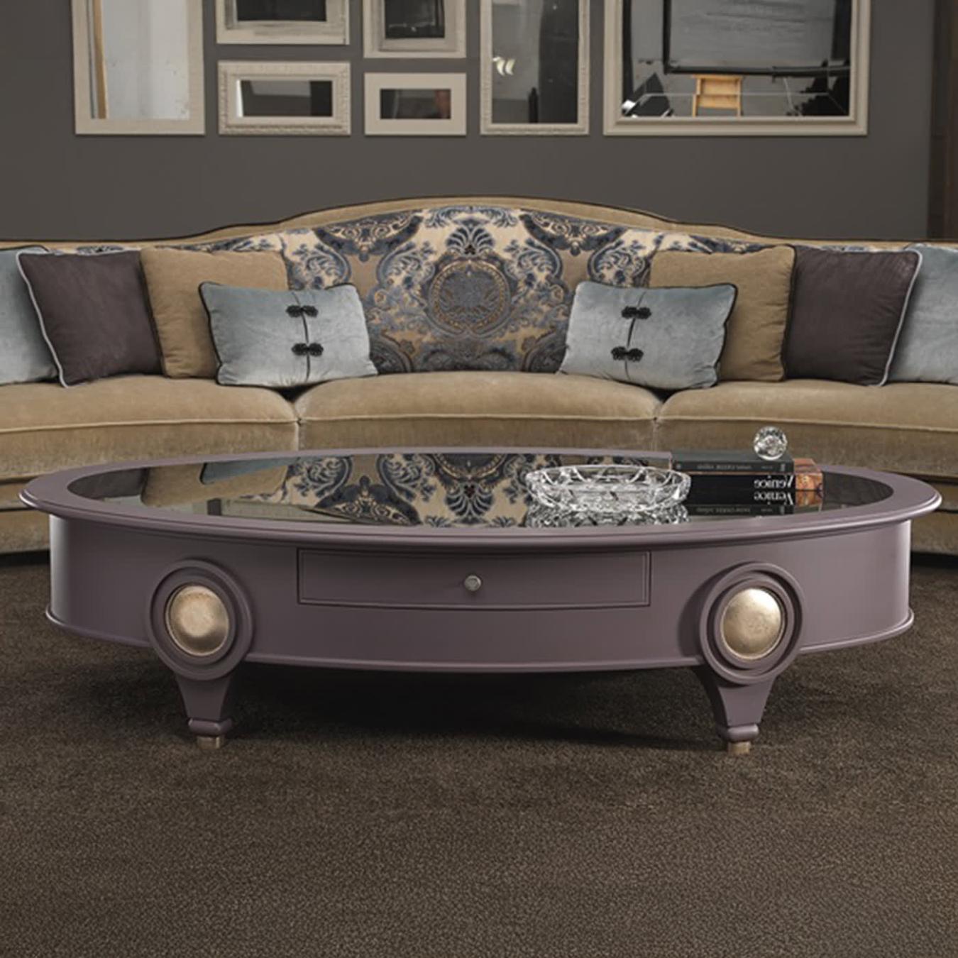 Table basse ovale basse avec plateau en miroir fumé