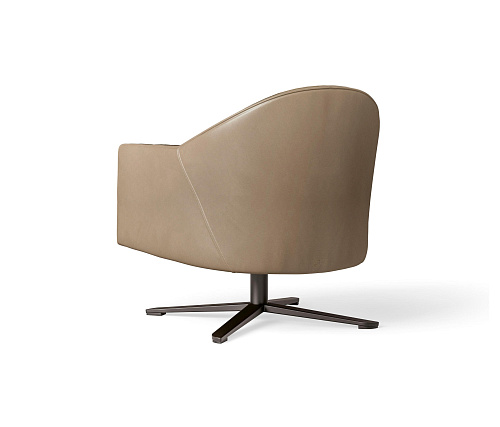 Fauteuil pivotant en cuir et tissu