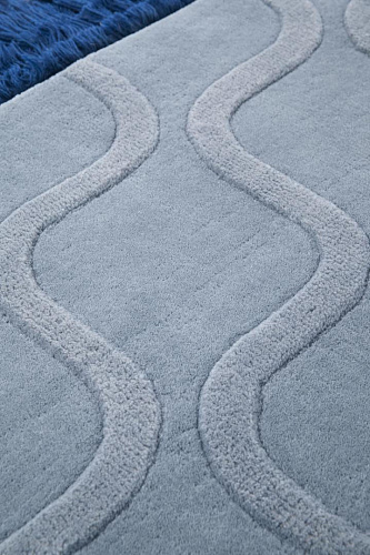 Lichtblauw handgetuft vloerkleed