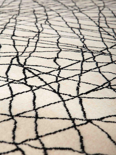Tapis design tissé main Tarassaco