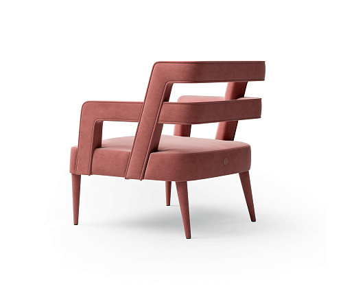 Fauteuil rose capitonné