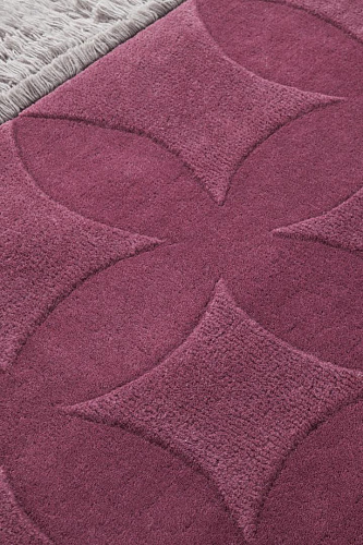 Tapis aubergine tufté main
